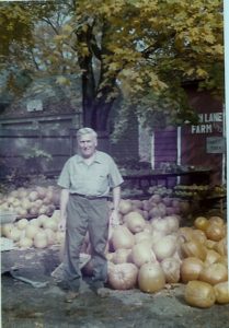 Herb by the farmstand in 1974. 