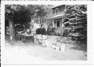 This 1930s photo shows a self-service wagon set up with farm produce outside Roy and Daisy's home on Greenlawn Rd.