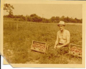 This image of Roy was taken sometime in the 1940s, as he takes a break while picking strawberries. Color film was a new development!